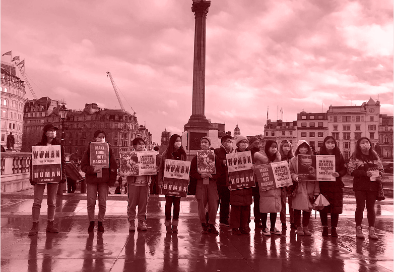 Historical protest scene with people holding signs